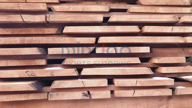 The processed hard beech wood planks were stacked together The processed hard beech wood planks were stacked together