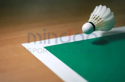 Badminton court with white lines drawn Badminton court with white lines drawn