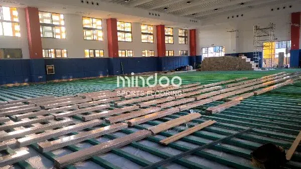 Multi-layered basketball court wood flooring