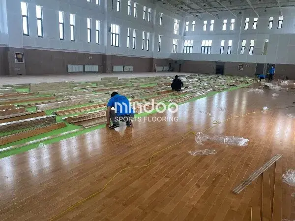 wood basketball floor installation-mindoo-sports centers
