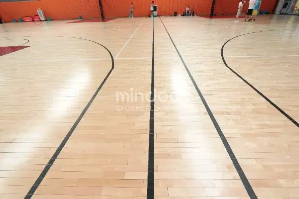 Natural texture and warm colors of wood sports flooring Natural texture and warm colors of wood sports flooring
